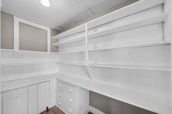 a view of an empty walk in closet