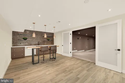 a room with two chairs and a table