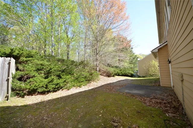 a view of a backyard of a house