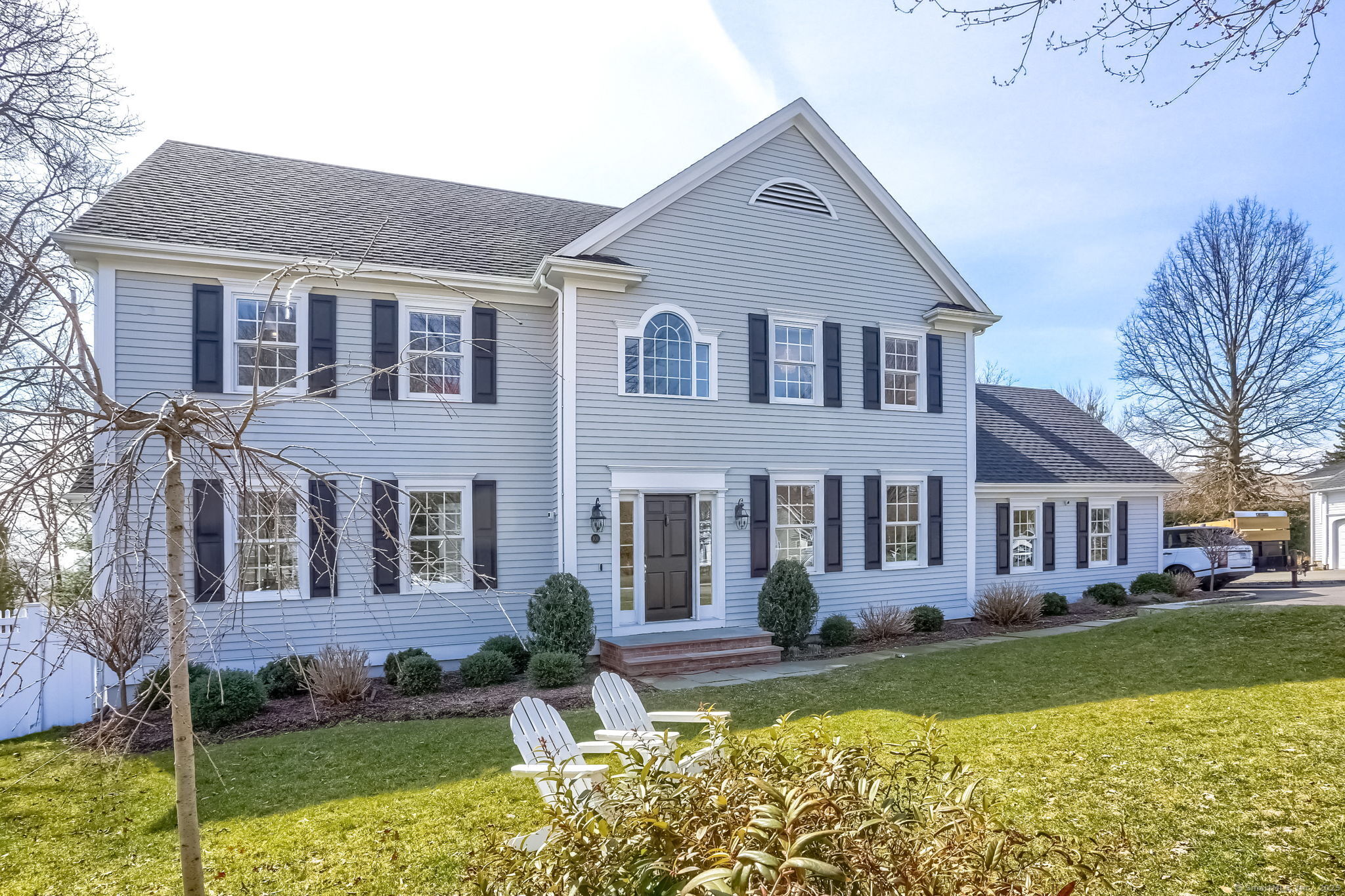front view of a house with a yard