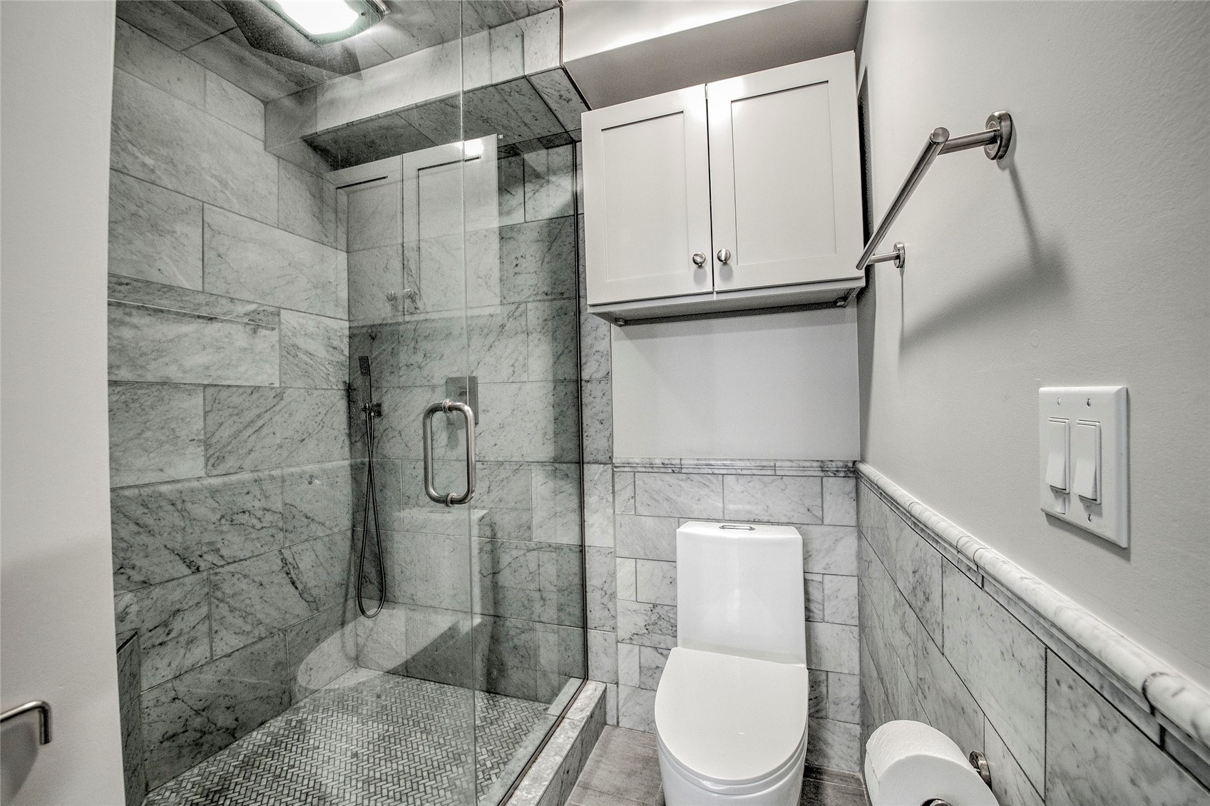 1120 Ski Hill Road, Unit 16 Breckenridge, CO 80424 - Photo 12 of 23 a bathroom with a toilet and shower