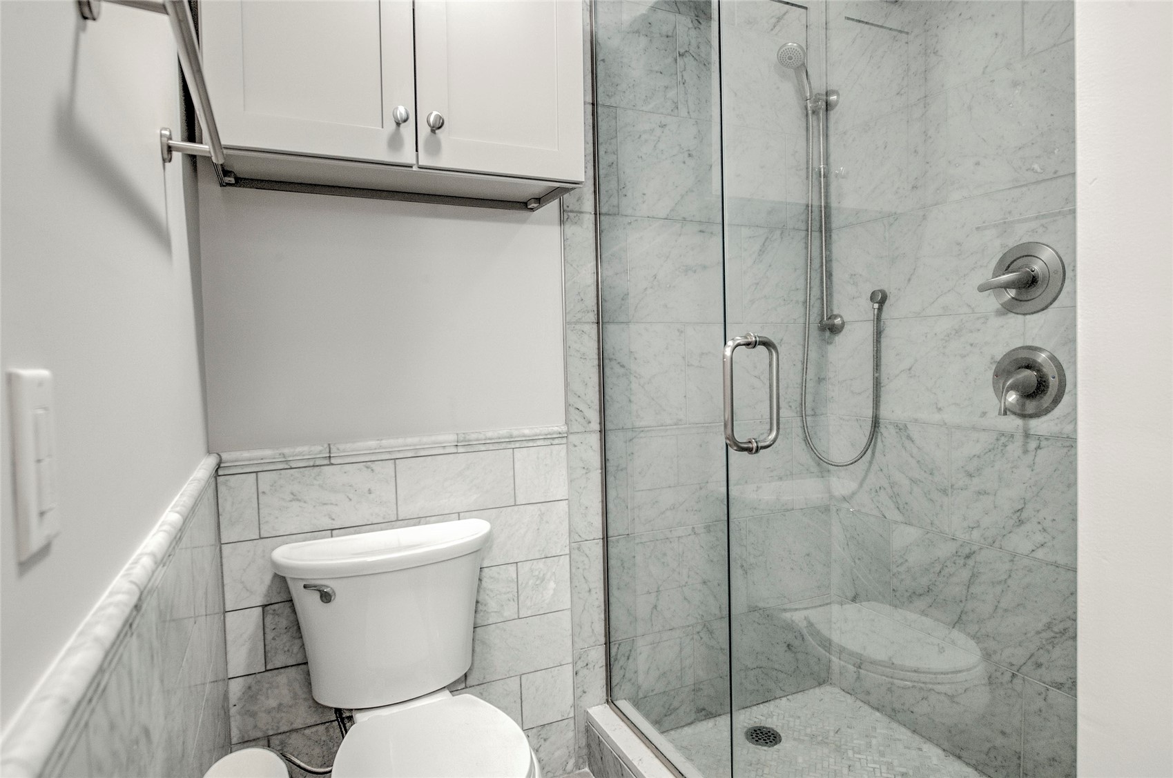 1120 Ski Hill Road, Unit 16 Breckenridge, CO 80424 - Photo 14 of 23 a bathroom with a toilet and a shower