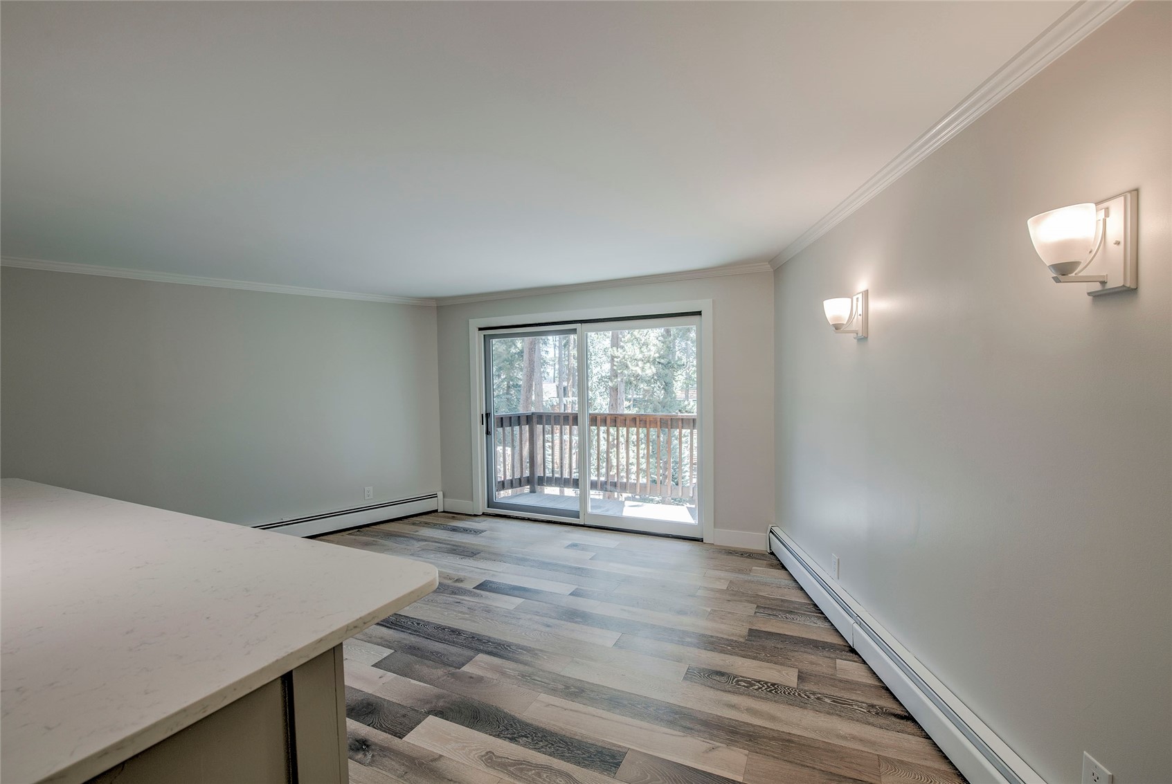 1120 Ski Hill Road, Unit 16 Breckenridge, CO 80424 - Photo 23 of 23 a view of an empty room with wooden floor and a window