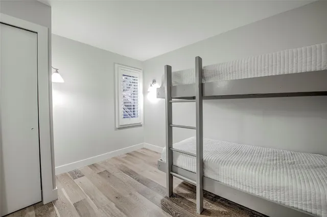 a room that has a bed and a window