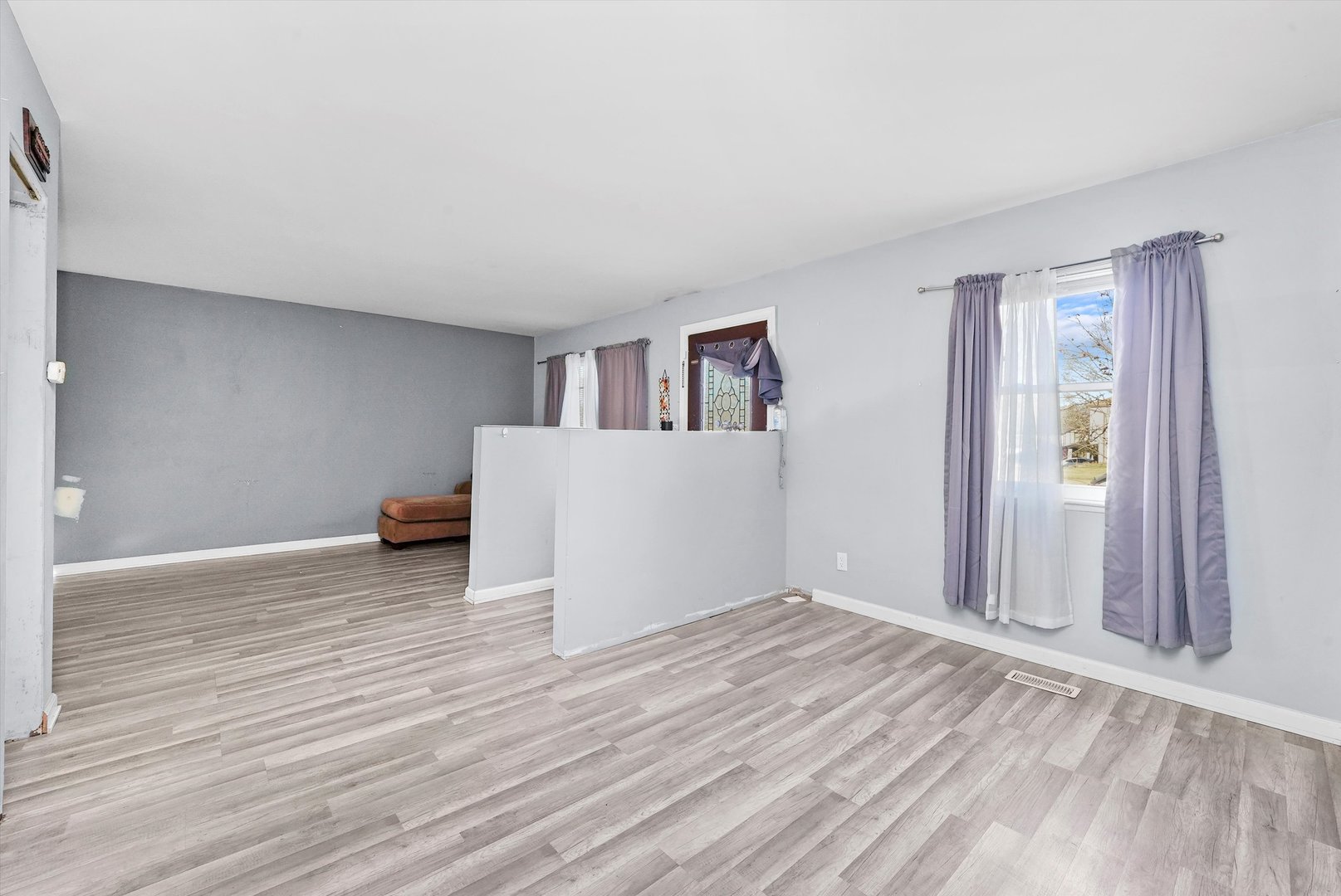 233 Rockhurst Road Bolingbrook, IL 60440 - Photo 11 of 29 a view of a livingroom with wooden floor