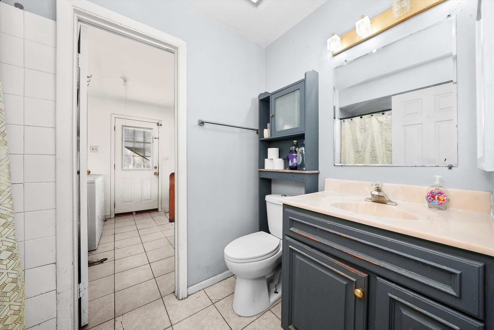 233 Rockhurst Road Bolingbrook, IL 60440 - Photo 12 of 29 a en suite bathroom with a sink a toilet and a mirror