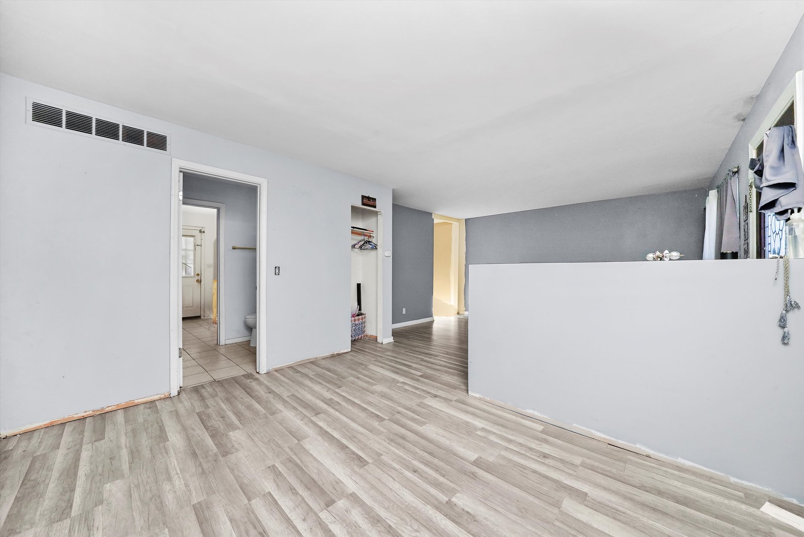 233 Rockhurst Road Bolingbrook, IL 60440 - Photo 13 of 29 a view of empty room with wooden floor