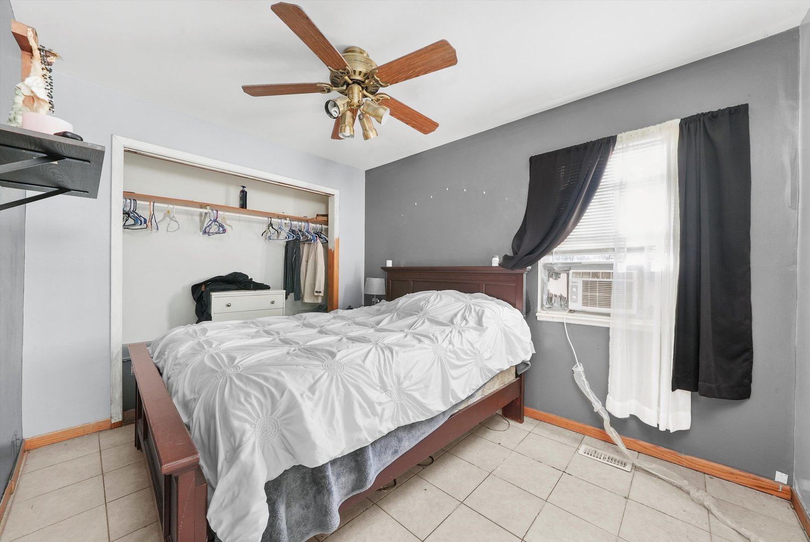 233 Rockhurst Road Bolingbrook, IL 60440 - Photo 16 of 29 a bedroom with a bed and a flat screen tv