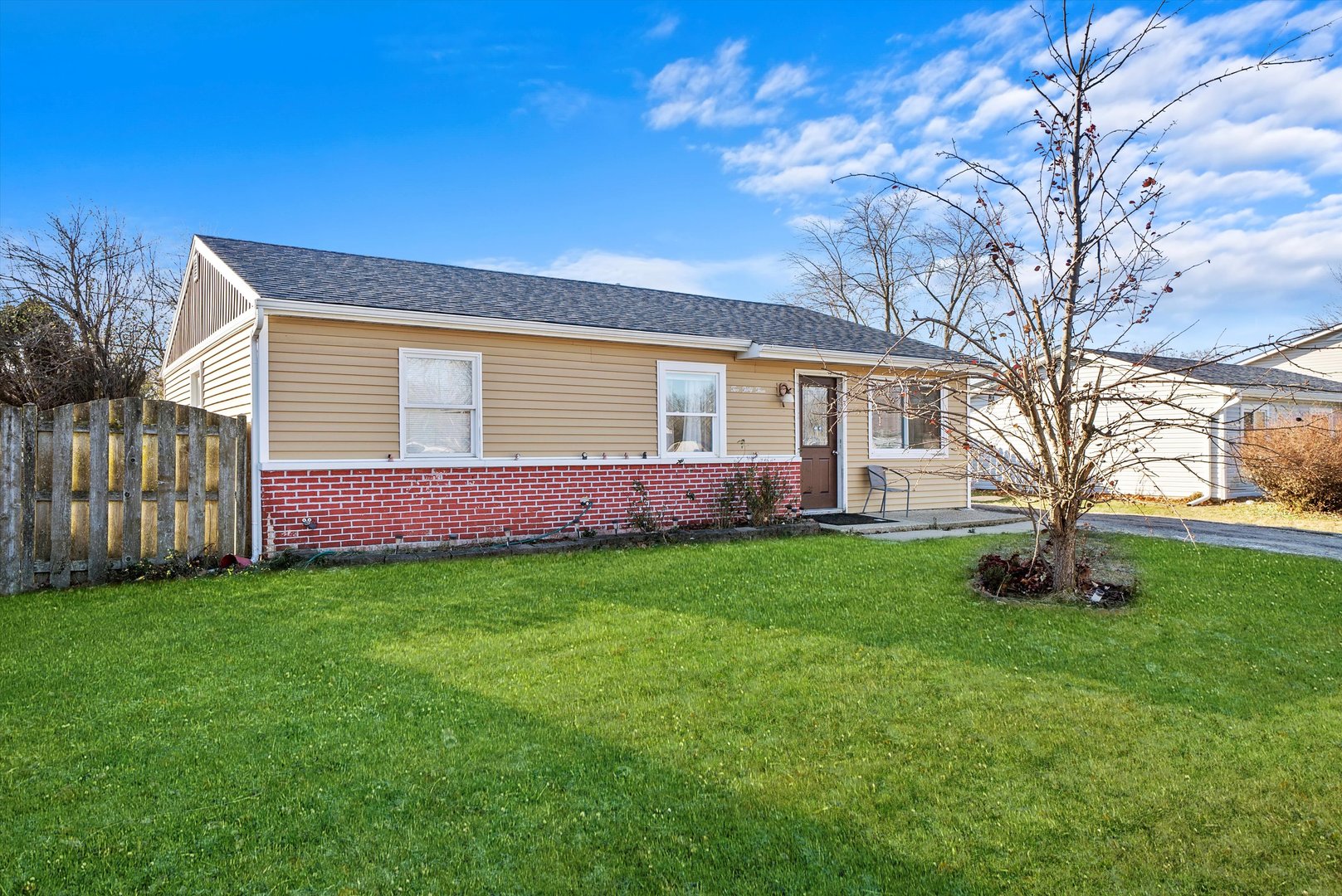 233 Rockhurst Road Bolingbrook, IL 60440 - Photo 5 of 29 a view of backyard of house with green space