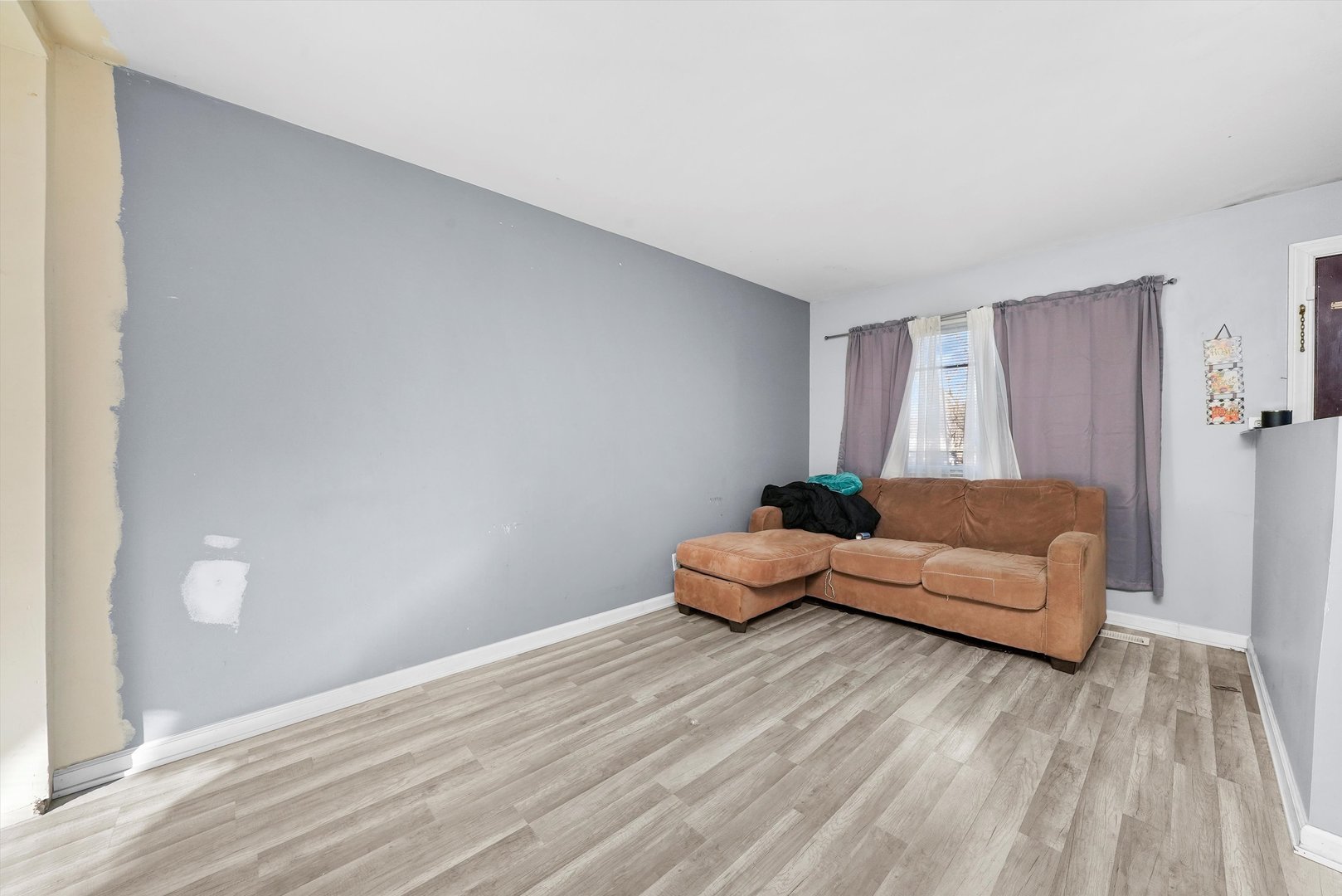 233 Rockhurst Road Bolingbrook, IL 60440 - Photo 6 of 29 a room with a bed and a couch