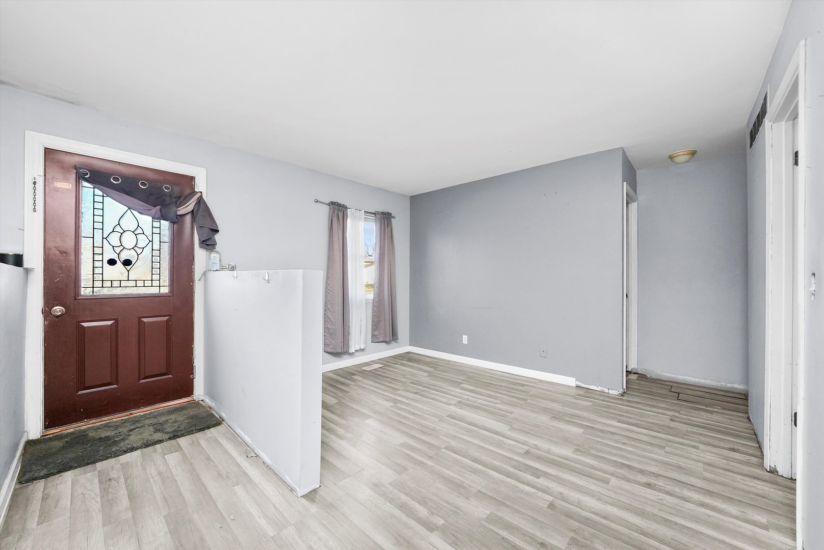 233 Rockhurst Road Bolingbrook, IL 60440 - Photo 9 of 29 a view of an empty room with closet and a window