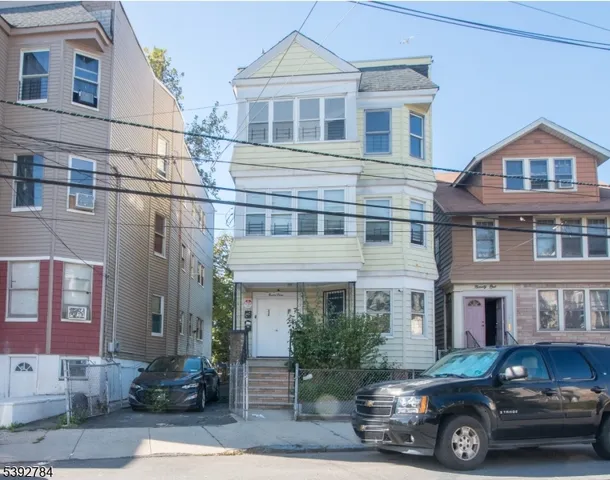 a car parked in front of a building