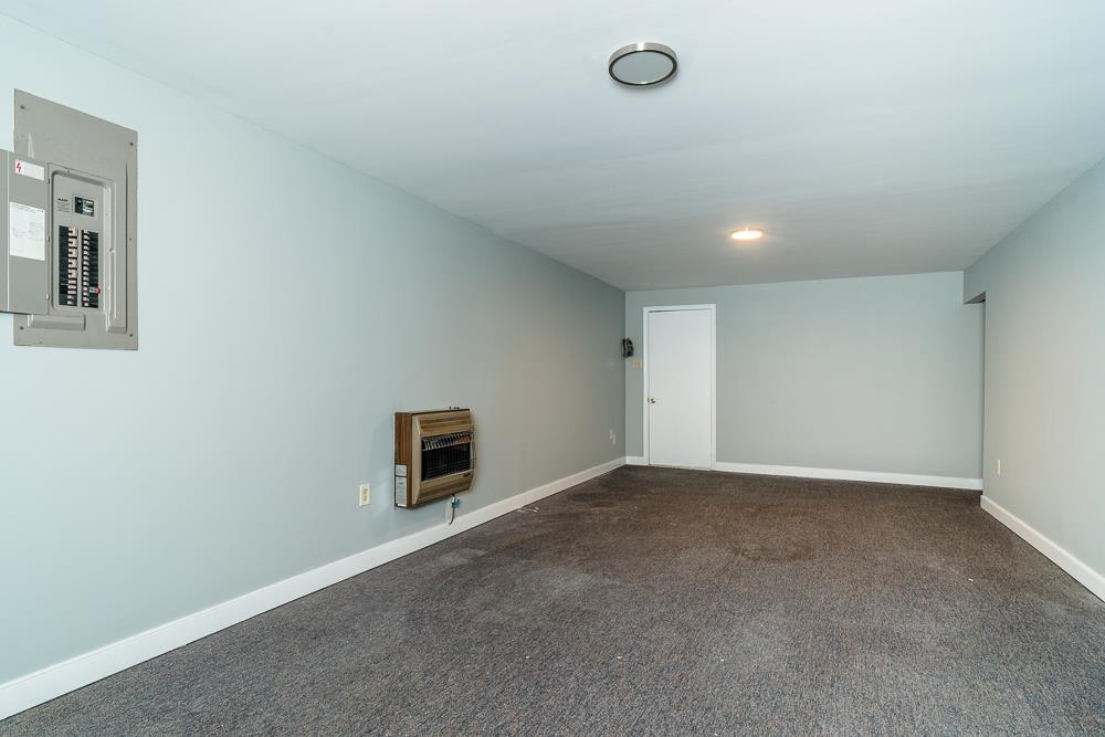 80 Phlox Road Ruckersville, VA 22968 - Photo 15 of 30 an empty room with windows