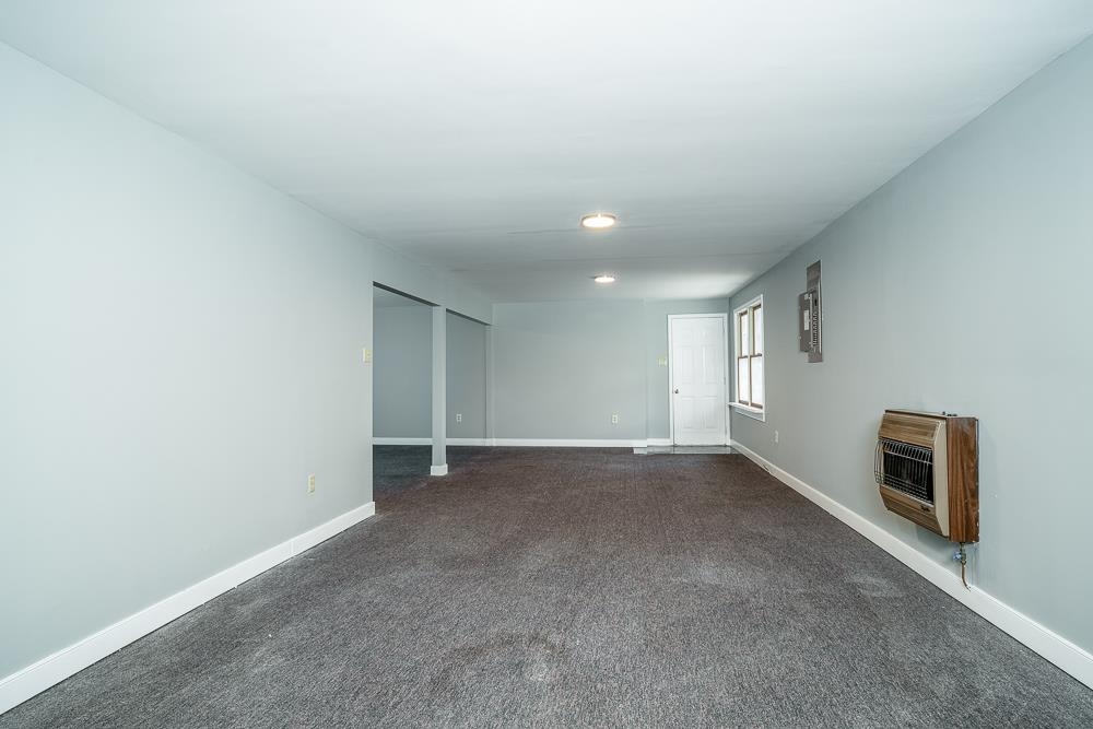 80 Phlox Road Ruckersville, VA 22968 - Photo 17 of 30 an empty room with windows