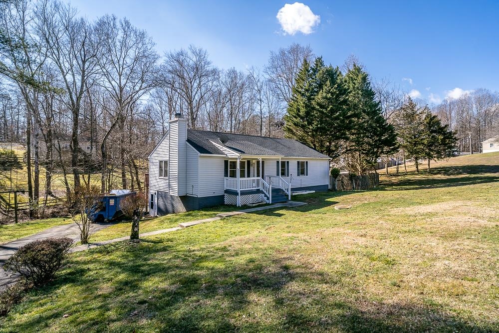 80 Phlox Road Ruckersville, VA 22968 - Photo 22 of 30 a view of a house with a yard outdoor and sitting area