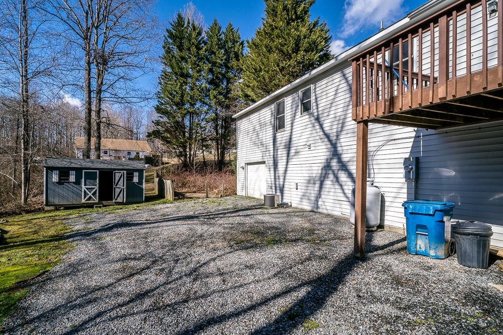 80 Phlox Road Ruckersville, VA 22968 - Photo 25 of 30 a view of a house with a yard