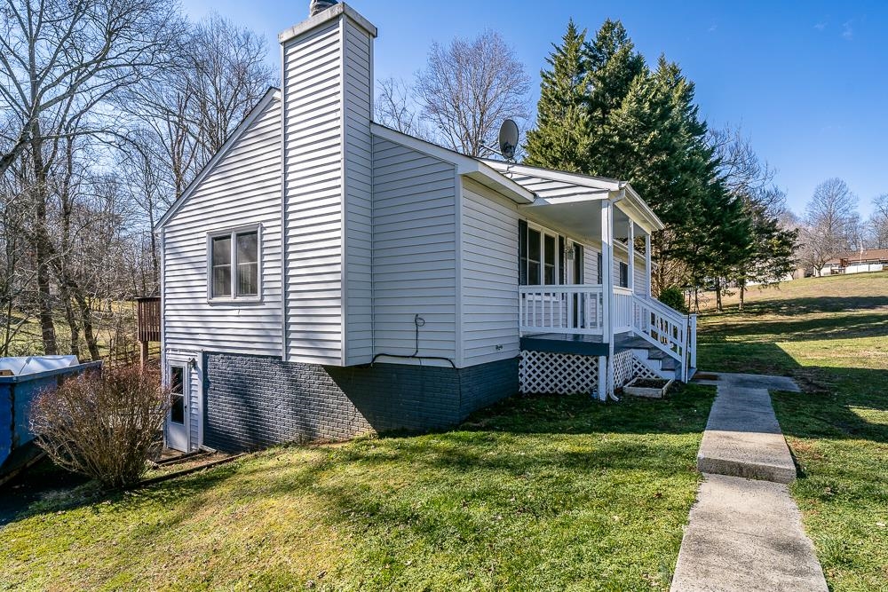 80 Phlox Road Ruckersville, VA 22968 - Photo 30 of 30 a view of a house with a yard