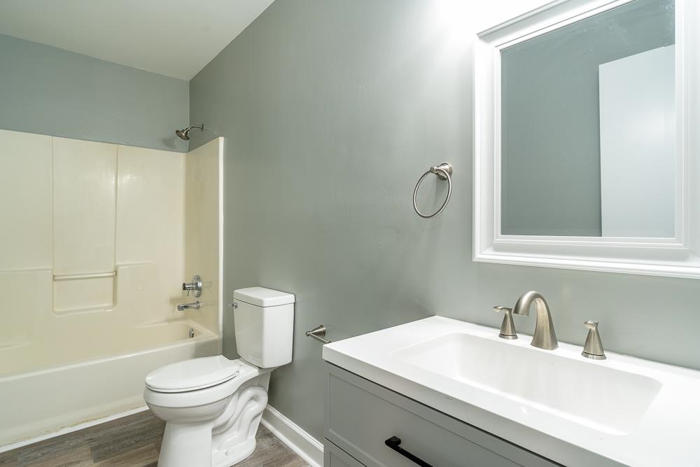 80 Phlox Road Ruckersville, VA 22968 - Photo 6 of 30 a bathroom with a sink a toilet and shower