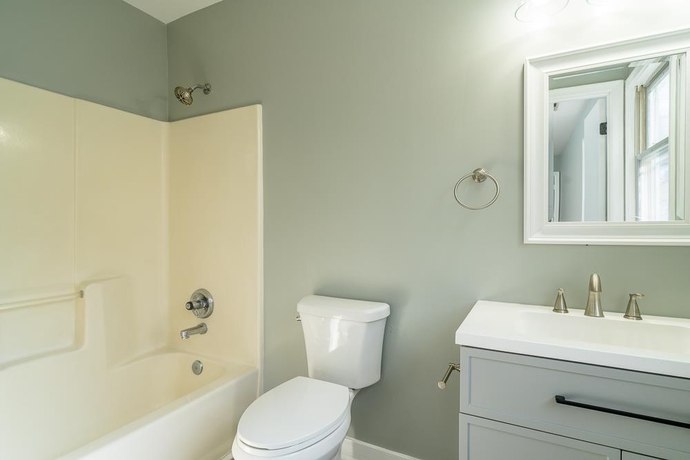80 Phlox Road Ruckersville, VA 22968 - Photo 8 of 30 a bathroom with a sink a toilet and shower