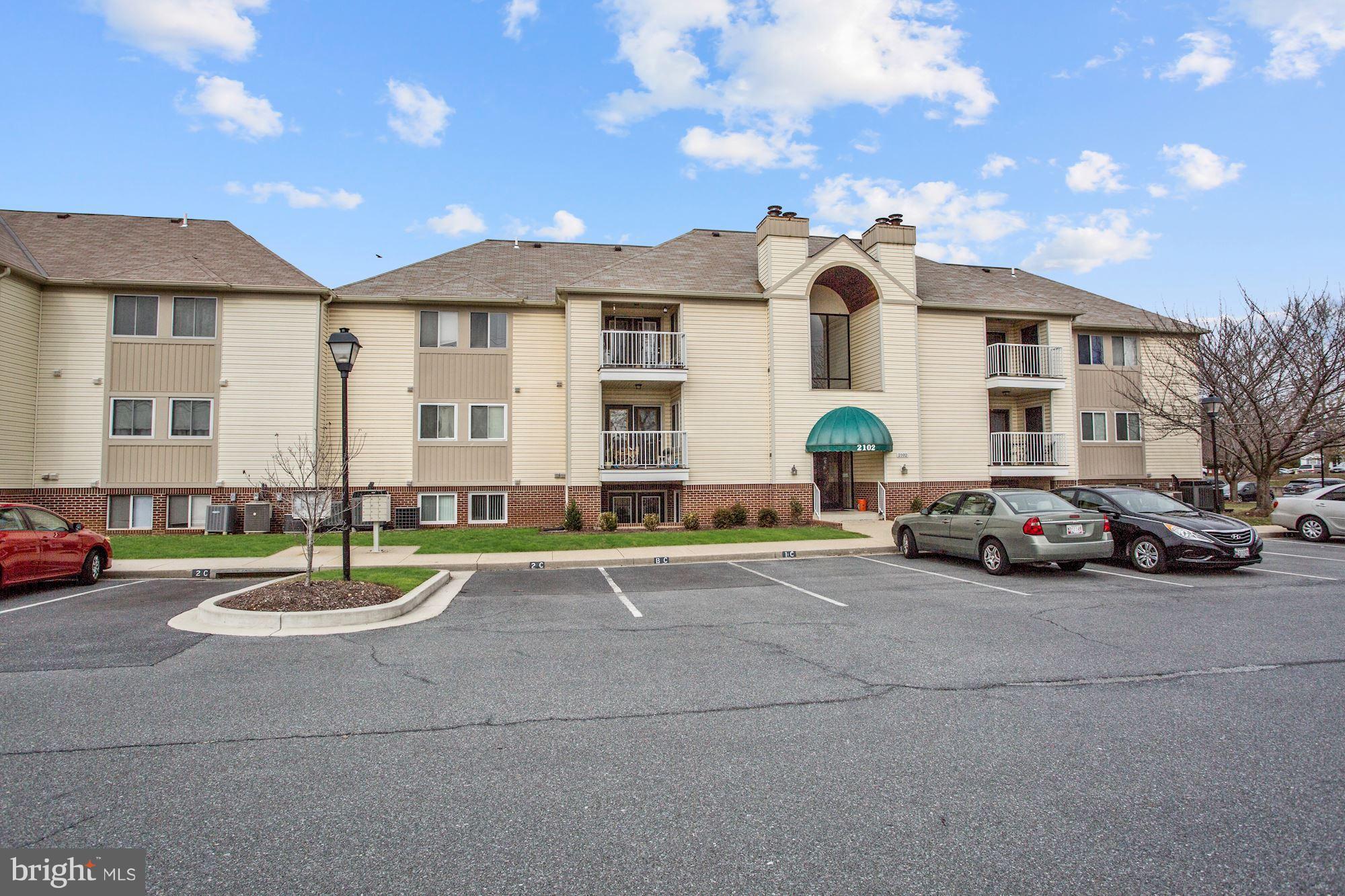 2102 Whitehall Road, Unit 2C Frederick, MD 21702 - Photo 1 of 28 a front view of a house with a yard