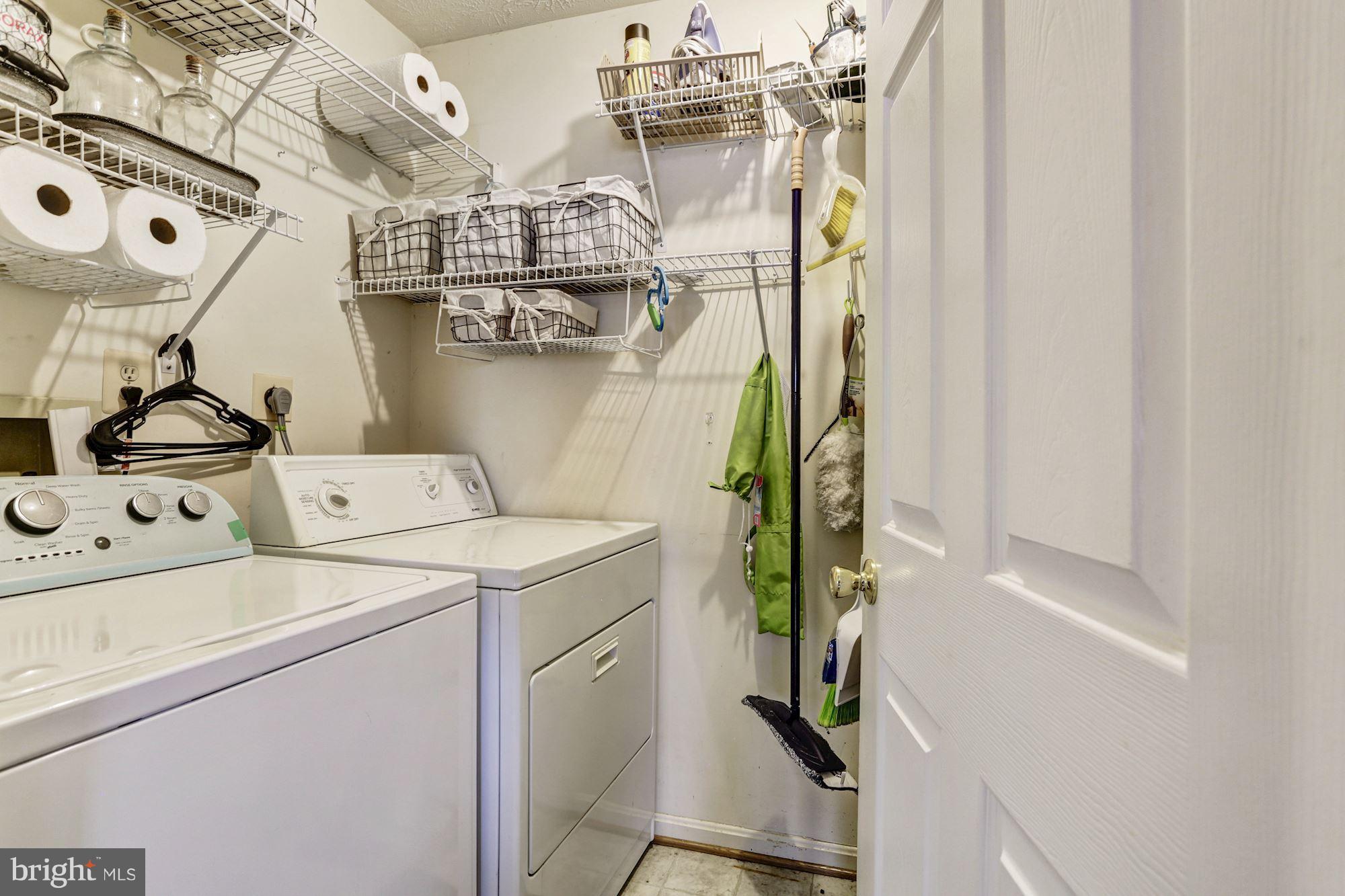 2102 Whitehall Road, Unit 2C Frederick, MD 21702 - Photo 18 of 28 a utility room with dryer and washer