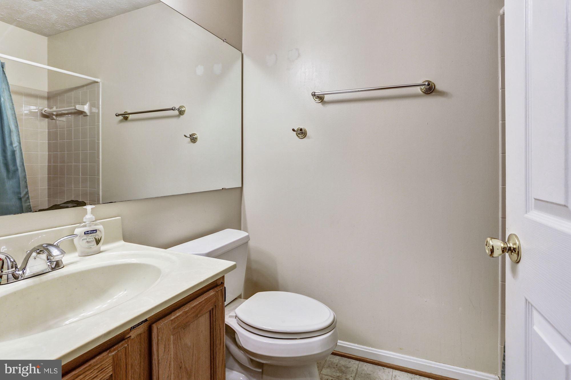 2102 Whitehall Road, Unit 2C Frederick, MD 21702 - Photo 20 of 28 a bathroom with a sink toilet and shower