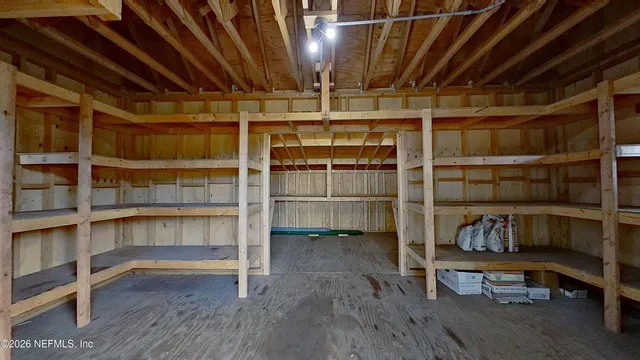 a view of an empty room with racks