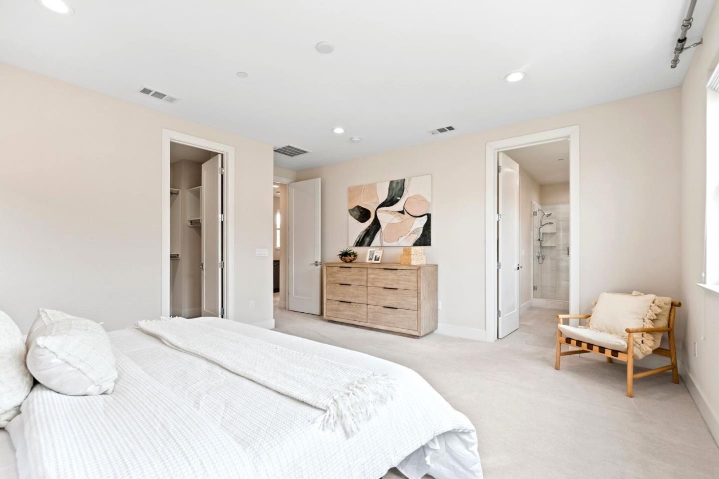 192 Melia Loop Mountain View, CA 94043 - Photo 27 of 40 a bedroom with a bed and a chair