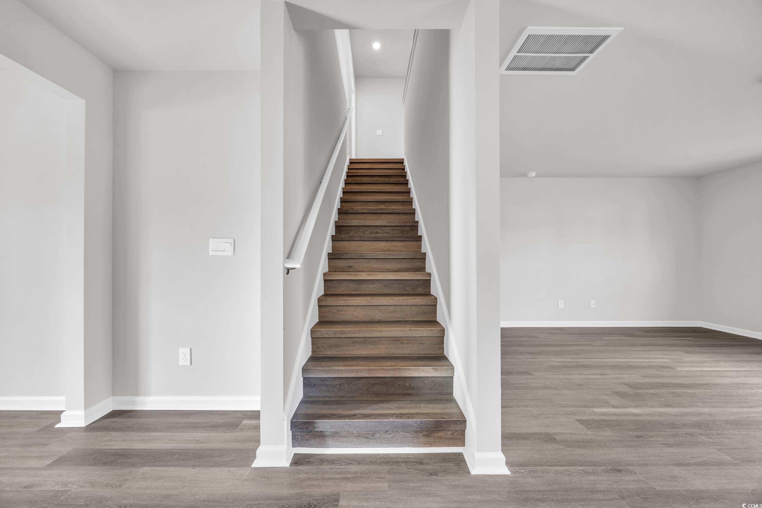 4071 Nelson Road Little River, SC 29566 - Photo 17 of 40 Staircase with wood-type flooring