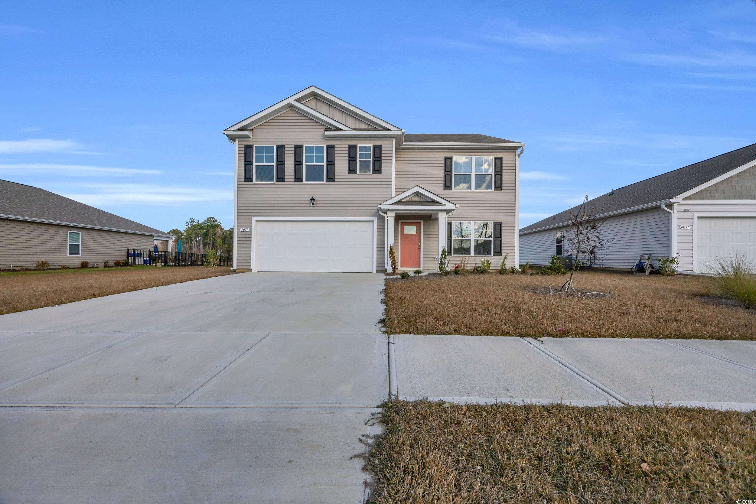 4071 Nelson Road Little River, SC 29566 - Photo 4 of 40 View of front property featuring a garage