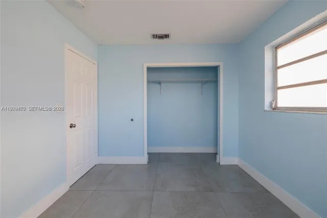 an empty room with a window