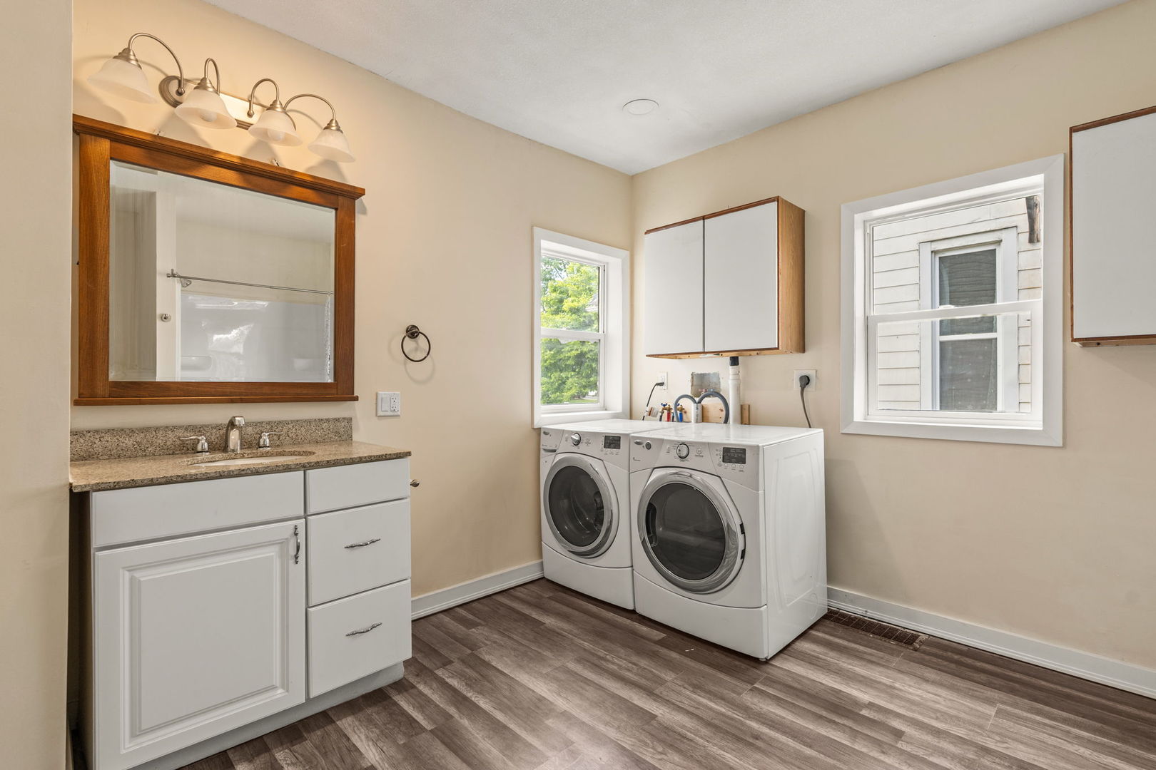 548 7th Avenue South Clinton, IA 52732 - Photo 8 of 23 a utility room with sink dryer and washer