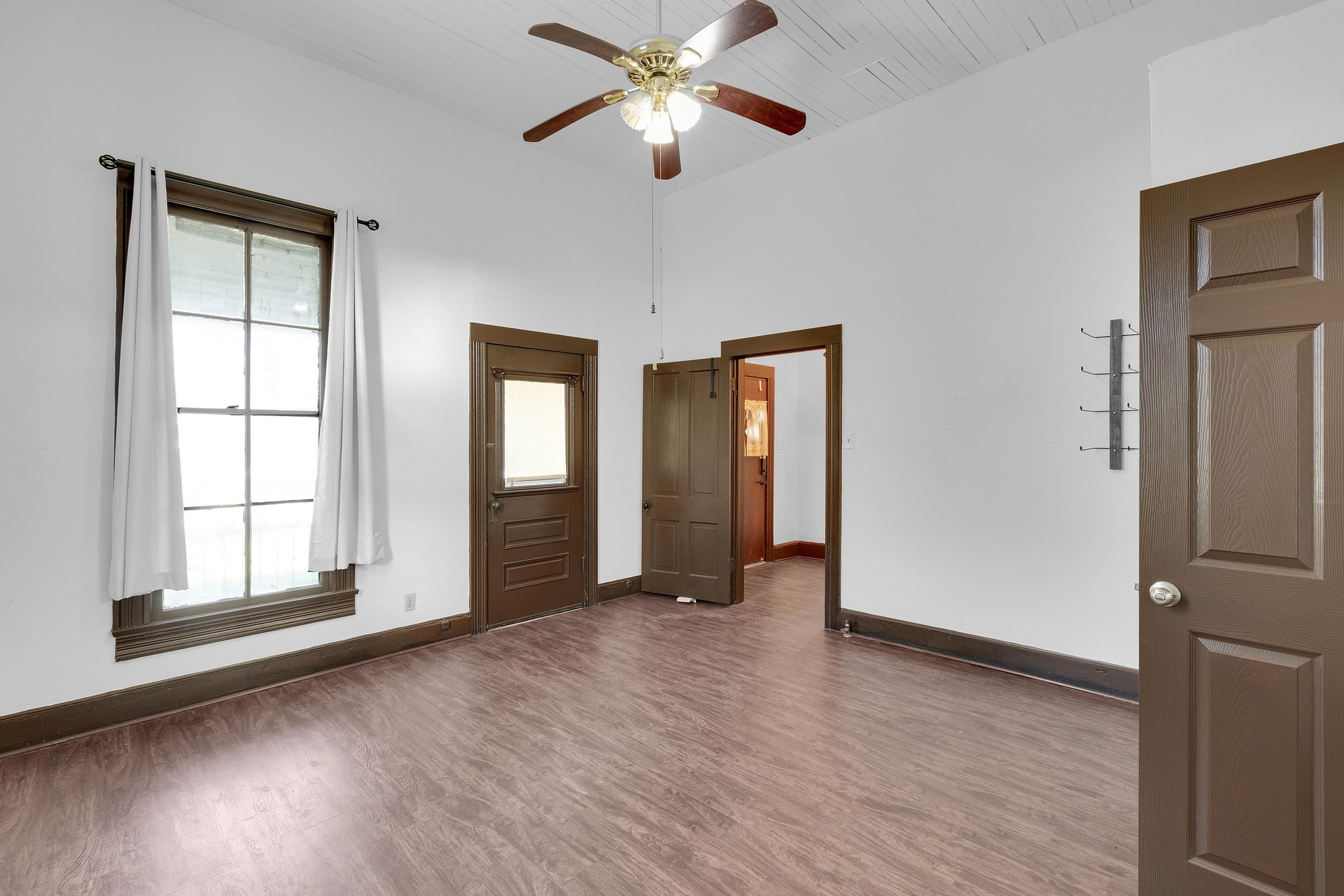 2705 East 2nd Street Austin, TX 78702 - Photo 6 of 36 If you need a dedicated workspace, this room could easily function as a home office with room for bookshelves, a large desk, and a comfortable reading nook
