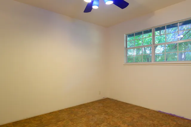 an empty room with a window