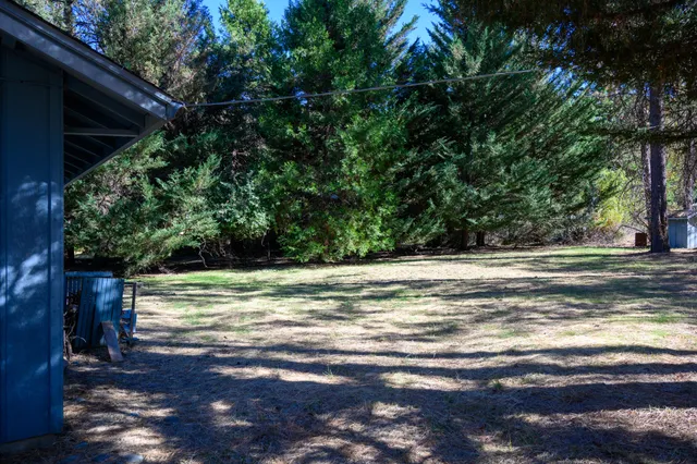a view of a yard with an outdoor space
