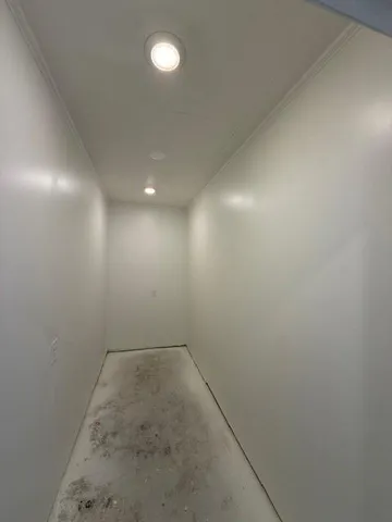 a view of a room with an empty space