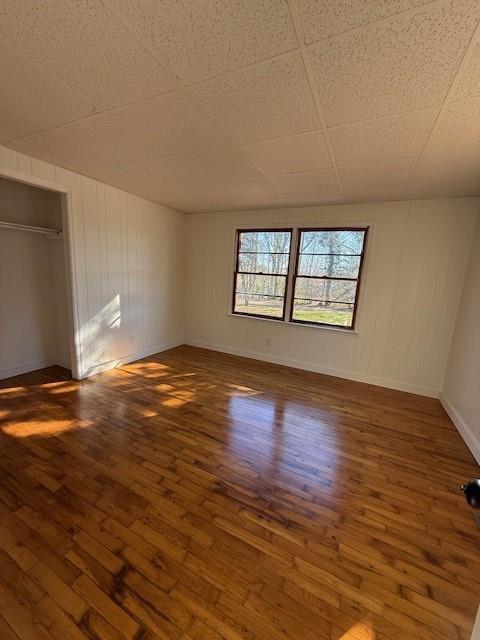 6815 Duncan Road Lula, GA 30554 - Photo 13 of 44 a view of an empty room with window and wooden floor
