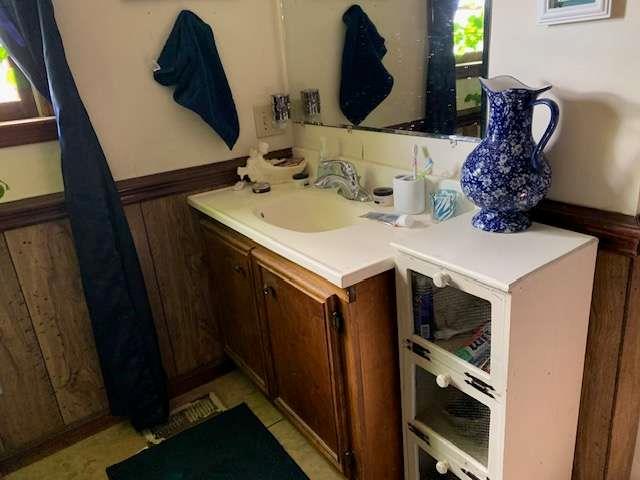 6815 Duncan Road Lula, GA 30554 - Photo 17 of 31 a bathroom with a sink and a mirror