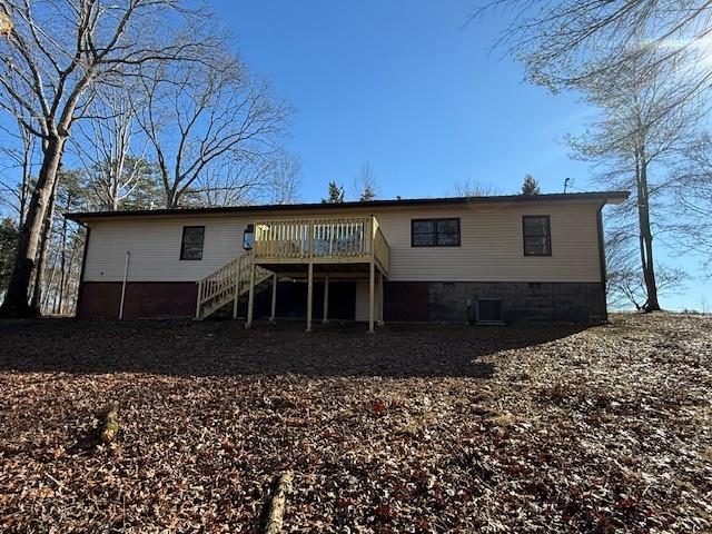 6815 Duncan Road Lula, GA 30554 - Photo 2 of 44 a view of a backyard with a large tree