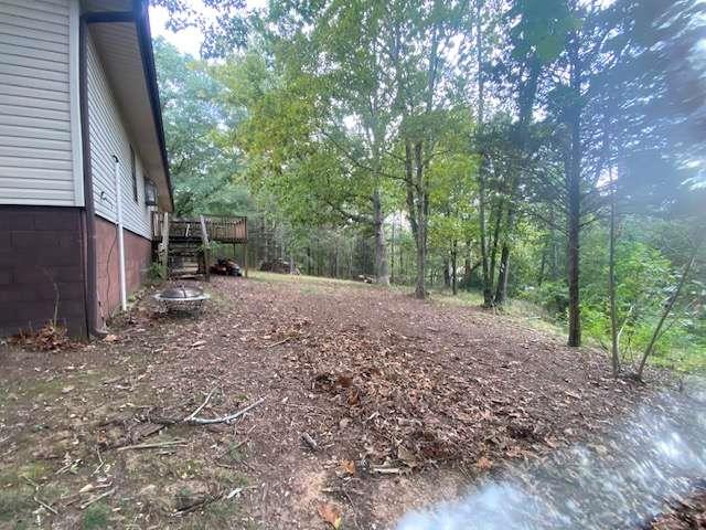 6815 Duncan Road Lula, GA 30554 - Photo 22 of 31 a view of a forest with trees in the background