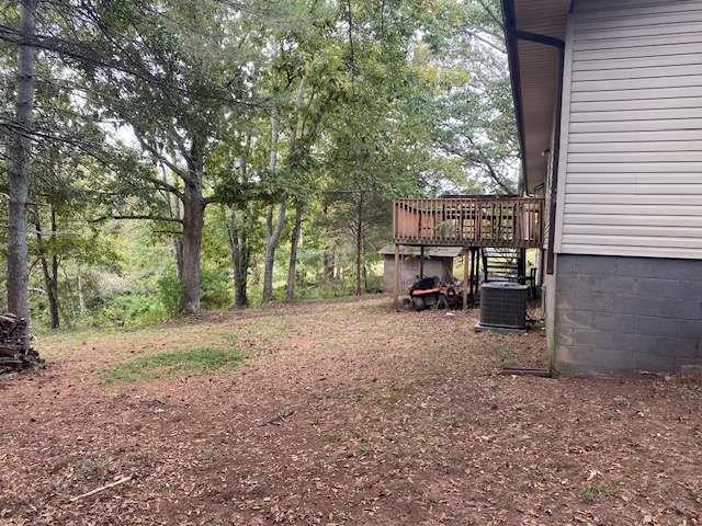 6815 Duncan Road Lula, GA 30554 - Photo 26 of 31 a view of a backyard with large trees