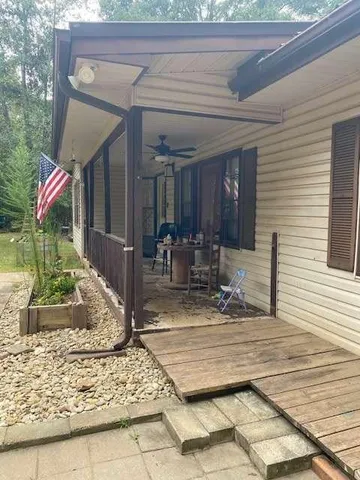 a view of a building with sitting area