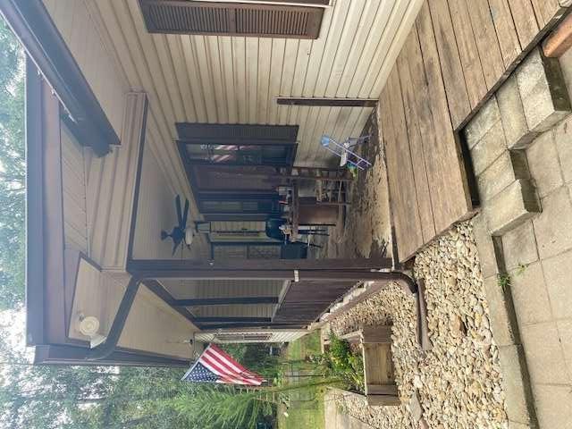 6815 Duncan Road Lula, GA 30554 - Photo 3 of 31 a view of a building with sitting area