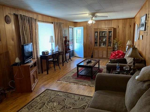 6815 Duncan Road Lula, GA 30554 - Photo 5 of 31 a living room with furniture and a flat screen tv
