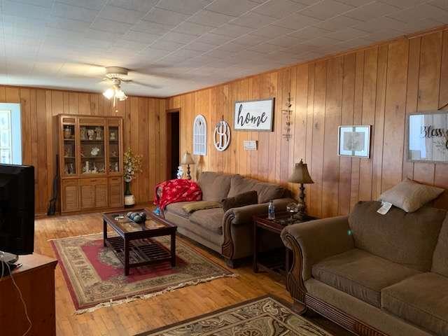 6815 Duncan Road Lula, GA 30554 - Photo 6 of 31 a living room with furniture and a potted plant