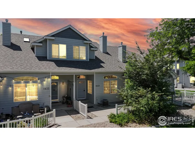 a black and white building with a large windows