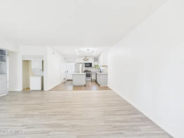 a view of a kitchen with a sink