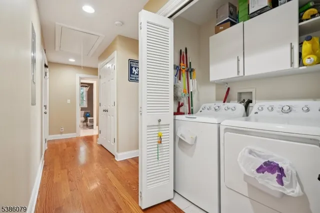 a storage room with washer and dryer