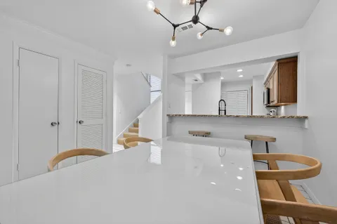 a view of a bathroom with a shower curtain