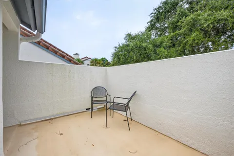 a view of a swimming pool with a bench